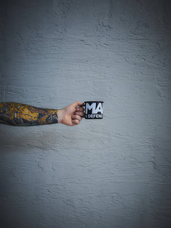 MANTO enamel mug LOGOTYPE black